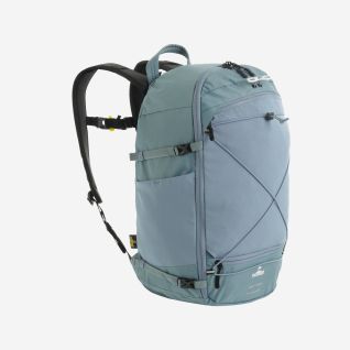 NOMAD Montagon Premium 25-liter backpack in steel blue with adjustable shoulder straps and side pockets.