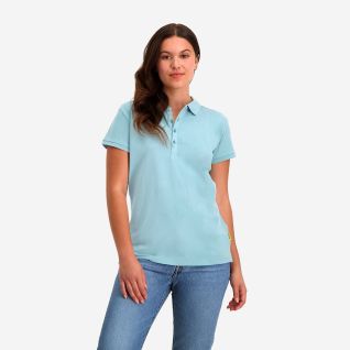 NOMAD women's pique polo in light blue with short sleeves and collar shown on a model