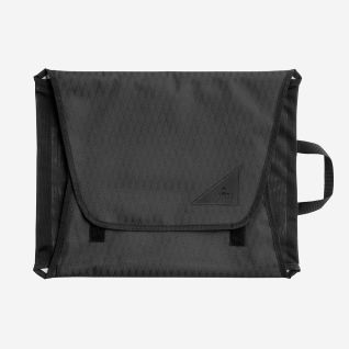 NOMAD black garment bag with handle and Velcro closure for organized clothing storage