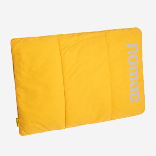 NOMAD Wollip multifunctional travel pillow in Sunset Yellow with a visible brand logo on the side