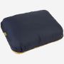 NOMAD Dry Touch Pillow in dark blue next to a yellow NOMAD mug on a white background.