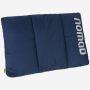 NOMAD Wollip multifunctional travel pillow in dark denim with logo next to a NOMAD enamel mug.