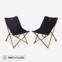 Set of two NOMAD Mando Lounge chairs with dark blue upholstery and wooden frames.
