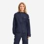 NOMAD premium women’s raincoat in dark blue with a hood and reflective details