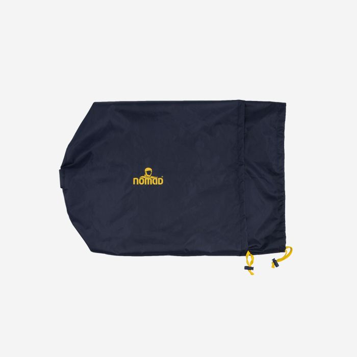 NOMAD stuff sack in dark blue with a yellow logo and yellow drawstring closure