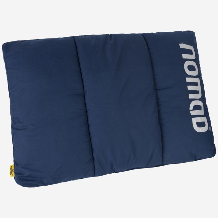 NOMAD wollip multifunctional travel pillow in dark denim with logo on the side.