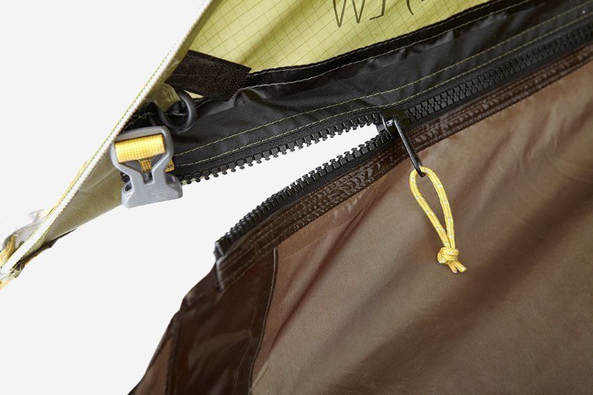 NOMAD zip-in floor for Dogon 3 plus 1 LW tent in dark gray with zipper detail and attachment.