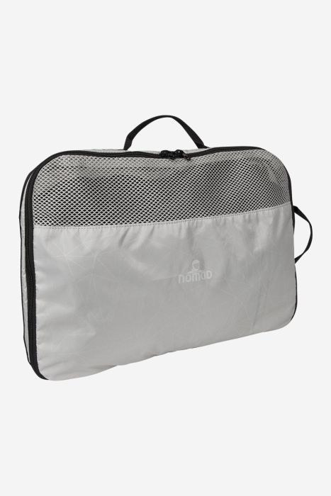 NOMAD packing cube in mist grey with mesh top, zipper, and carry handle for organized luggage