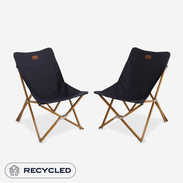 Set of two NOMAD Mando Lounge chairs with dark blue upholstery and wooden frames.
