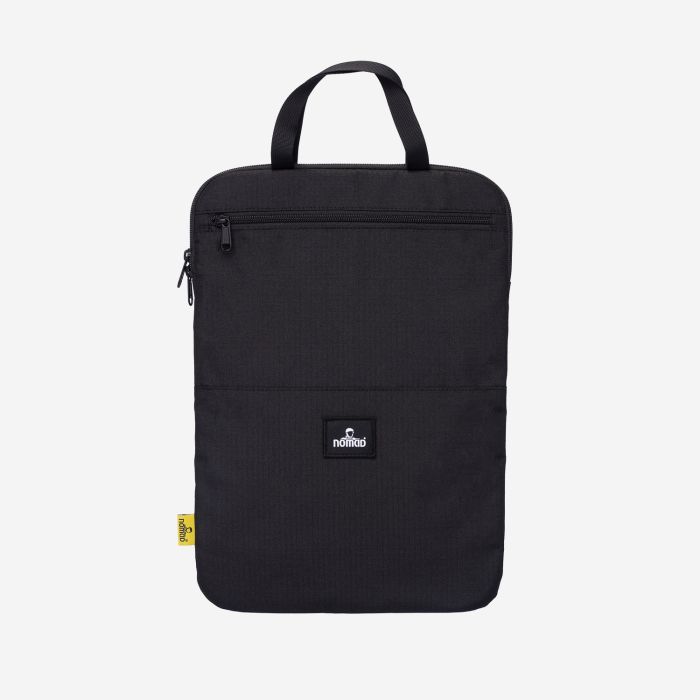 NOMAD black 15.6-inch laptop sleeve with zipper closure and carry handle.